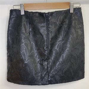 Blank NYC embroidered vegan leather mini skirt